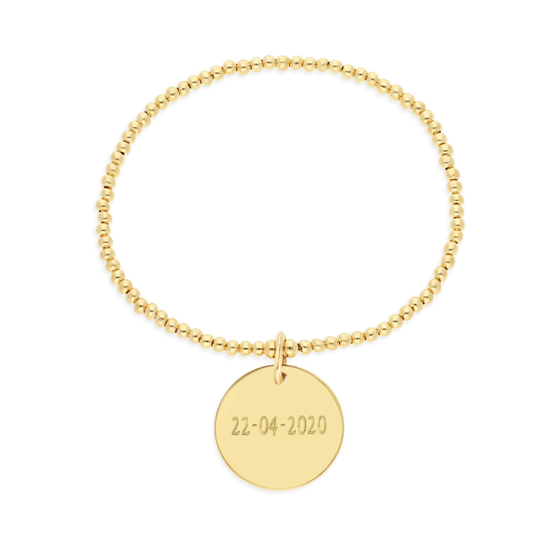 Packshot bracelet élastique perles Plaqué Or et médaille 20 mm gravée