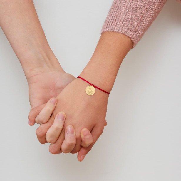 Bracelet cordon personnalisé plaqué or pour enfant avec une illustration de licorne.